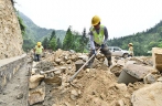 Paved road under construction in Gandong Township， Guangxi