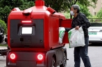 Unmanned delivery vehicles used in Shanghai to distribute supplies to residents