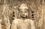 Restored giant Buddha statue of Lushena unveiled in Longmen Grottoes