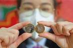 Commemorative coins for Year of the Rabbit officially issued
